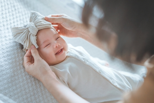 Happy,Excited,Newborn,Baby,Laughing,At,Mom,Face,,Positive,Emotions,