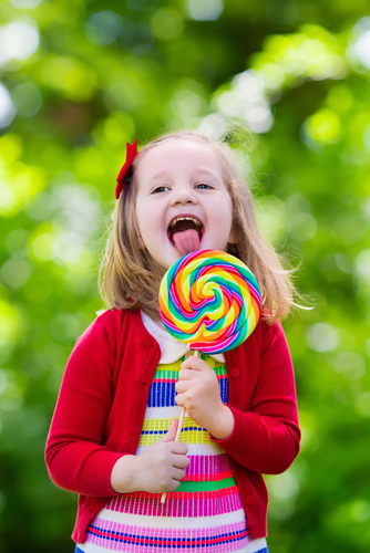 Cute,Little,Girl,With,Big,Colorful,Lollipop.,Child,Eating,Sweet